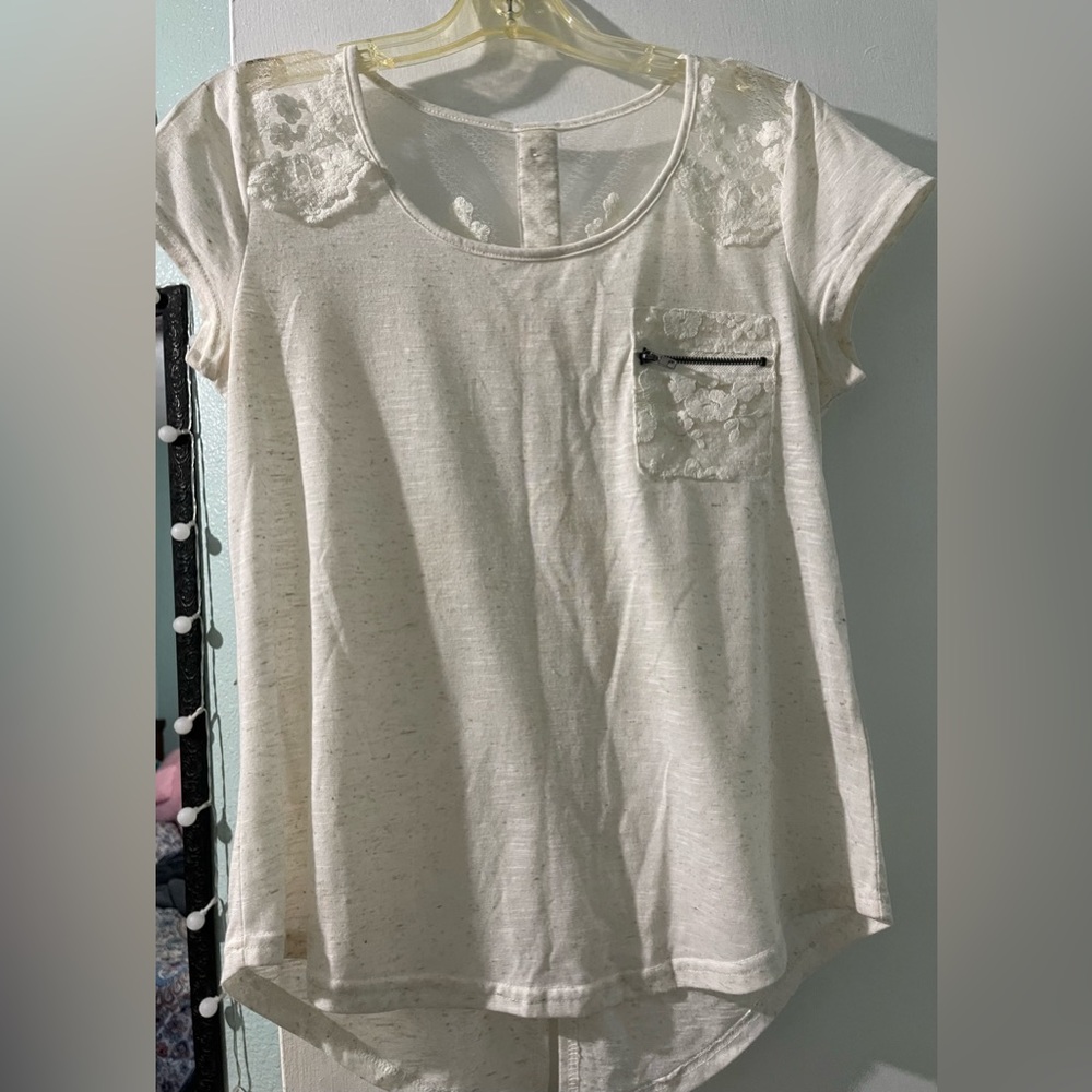 White/beige blouse.